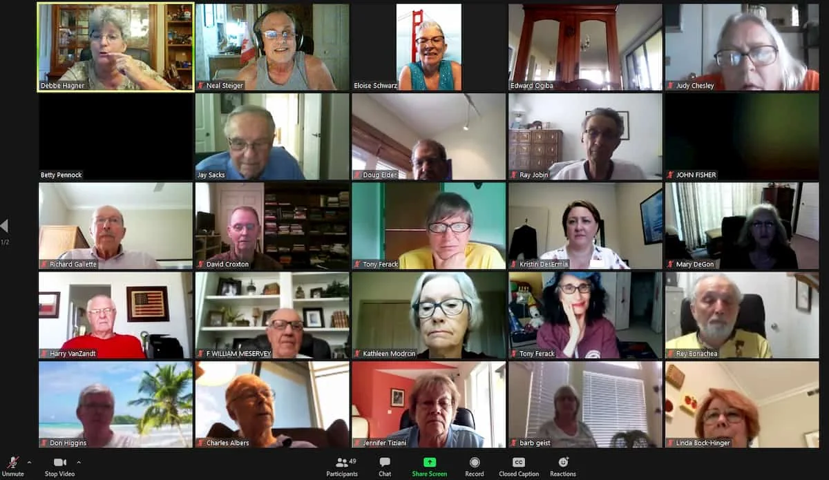 A captioned Zoom meeting showing a grid of HLAA members